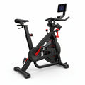 Black and red exercise bike with a digital display on a white background